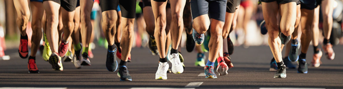 gambe di maratoneti
