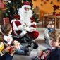Consegna dei regali di Babbo Natale all'asilo Sapienza