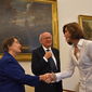 La ministra Anna Maria Bernini saluta Laura Sadori, docente del Dipartimento di Biologia ambientale, e Thijs Van Kolfschoten, presidente di INQUA